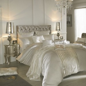 white-silk-bedding-on-bed
